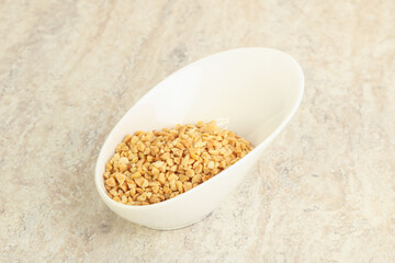 Crunched roasted peanut in the bowl