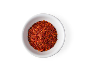 Cayenne pepper in a cup isolated on white background. Top view