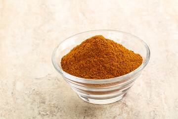 Dry Paprika powder in the bowl