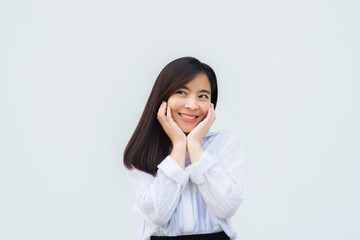 close up attractive adult business woman asian girl with happy and smile against white concrete wall office.