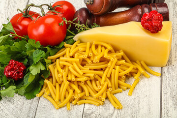 Italian pasta raw Maccheroni for cooking