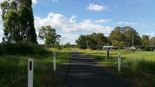 Kingaroy To Kilkivan Rail Trail Road With Trees