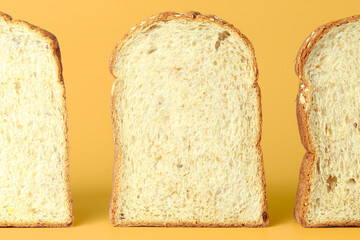 Set of three slices of bread slices isolated on yellow background.