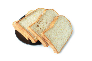selective focus of pile of toasted bread slices on a single black plate. On pure white background.