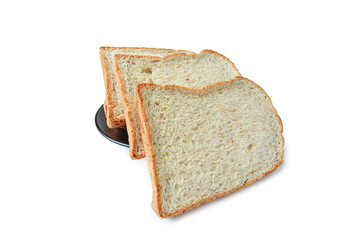 selective focus of pile of toasted bread slices on a single black plate. On pure white background.