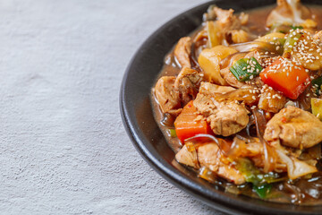 Andongjjimdak, Andong-style spicy stewed chicken : Originally from the Andong region, this dish consists of chicken, chili peppers, potatoes, clear noodles, leeks and carrots braised in a spicy sauce 