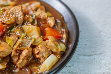 Andongjjimdak, Andong-style spicy stewed chicken : Originally from the Andong region, this dish consists of chicken, chili peppers, potatoes, clear noodles, leeks and carrots braised in a spicy sauce 