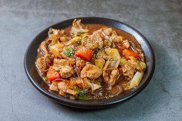 Andongjjimdak, Andong-style spicy stewed chicken : Originally from the Andong region, this dish consists of chicken, chili peppers, potatoes, clear noodles, leeks and carrots braised in a spicy sauce 