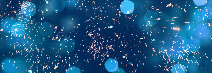 Panoramic blue festive background of firework