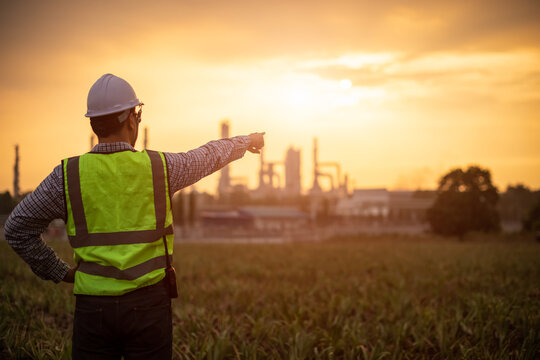 Officers Wearing Safety Clothing To Inspect The Work In The Area Is Quite Dangerous..