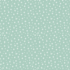 Transparent snow effect. Seamless textured pattern with a blue background. The circles are scattered randomly. 
