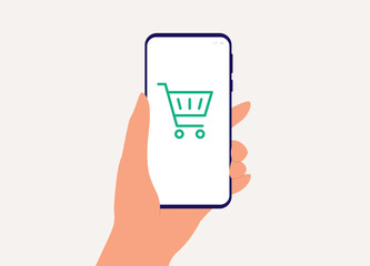 Close-Up View Of User's Hand Holding Mobile Phone With Shopping Cart Icon.