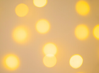 Blurred lights of a Christmas garland. Festive background and texture.