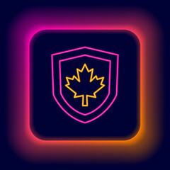 Glowing neon line Canada flag on shield icon isolated on black background. Colorful outline concept. Vector
