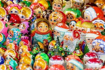 Fototapeta na wymiar Traditional handmade colorful russian doll matrioshka set. Russian souvenir