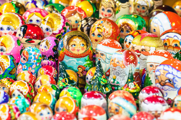 Fototapeta na wymiar Traditional handmade colorful russian doll matrioshka set. Russian souvenir