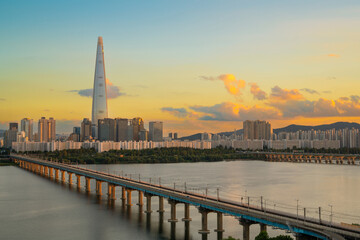 Panoramic view of Hangang River and Seoul city skyline with sunset sky in Korea