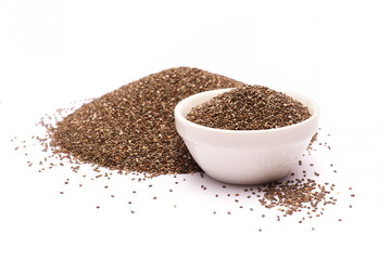 Ceramic bowl of organic natural chia seeds close-up isolated
