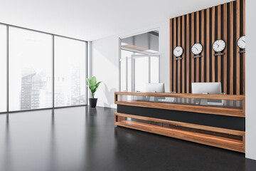 Corner view on bright office room interior with reception, window