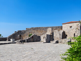 Fototapeta na wymiar The view of Budva medieval fortress of St. Mary, Citadel, landscape of Old town Budva, Montenegro: ancient walls, beautiful Landscape.