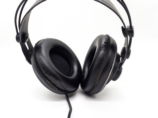 Fototapeta na wymiar black professional studio monitor headphones isolated on white background