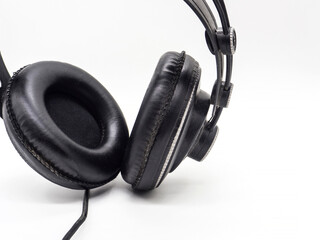 black professional studio monitor headphones isolated on white background