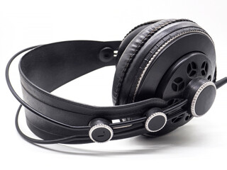 black professional studio monitor headphones isolated on white background