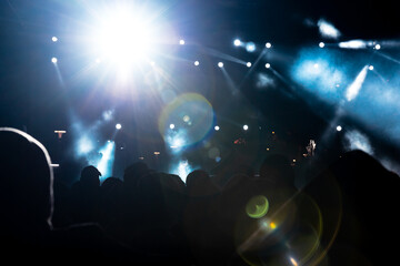 Fototapeta na wymiar Concert background photo. Spotlight glowing in the concert hall.