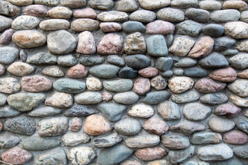 Wall of stones as an abstract background.