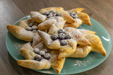 Baked puff pastry with toppings.Pastry recipe