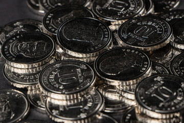 Ukrainian hryvnias coins. Background from Ukrainian coins 10 hryvnia. Money and finances.