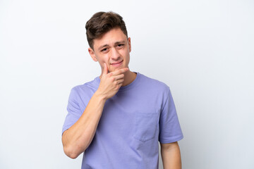 Young handsome Brazilian man isolated on white background having doubts