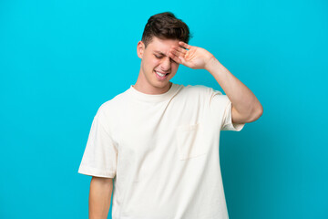 Fototapeta premium Young handsome Brazilian man isolated on blue background with tired and sick expression