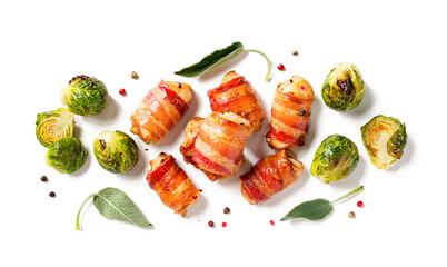 Appetizing Chicken breast wrapped in bacon, garnished with brussel sprout and sage leaves. Holiday...
