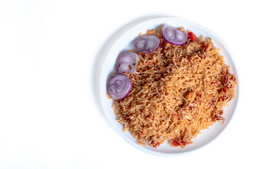 Isolated spicy chicken rice in white plate on white background,