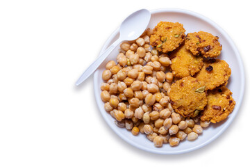 Tea time snacks vegetarian snacks Chickpea Sundal and Masala Vada (Lentils Wada) isolated on a white.