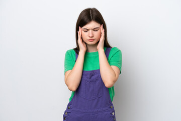 Young Russian woman isolated on blue background with headache