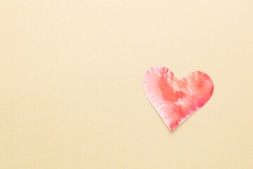 Cut the heart shaped paper, put on a pastel background.