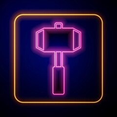 Glowing neon Sledgehammer icon isolated on black background. Vector