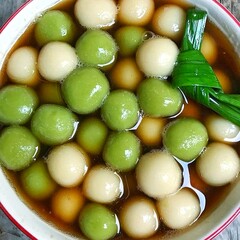 Wedang ronde,or glutinous sweet balls, served in a ginger-infused syrup and tossed with roasted peanuts.