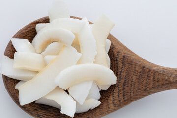 Coconut chips in bowl, space for copy text.