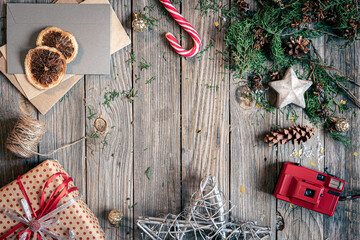 Christmas flat lay background on wooden surface, copy space.