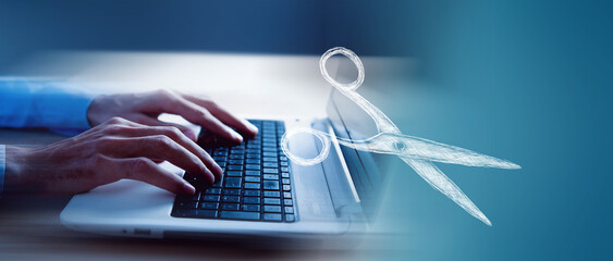 drawn scissors. man in front of laptop