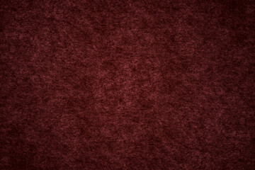 Red color grunge carpet surface close up top view for texture background