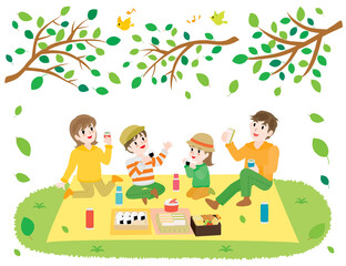 Obraz na płótnie Canvas ピクニックでお弁当を食べる家族