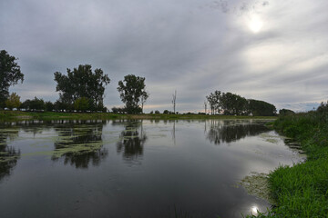 reflection of clouds in the river