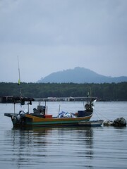 Fototapeta na wymiar fishing boat at the river