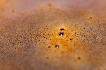 Coffee crema, espresso. Bubble foam. Soft focus background. Invigorating drink in the morning