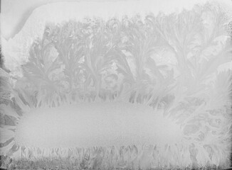 frosty pattern on the windows frost ice on glass cold background pattern