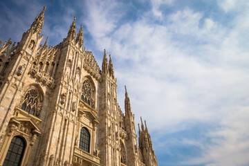 Fototapeta na wymiar Milan Cathedral (Duomo di Milano) with blue sky and sunset light
